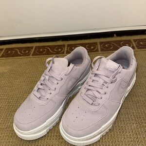 Nike Air Force 1s sneakers in light purple/lavender color. Size 7.